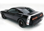 Black Dodge Challenger with white stripes, shown from a rear three-quarter angle.