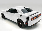 White Dodge Challenger with black side & trunk stripes, shown from a rear on a white background.