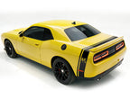 Yellow Dodge Challenger with a black side & trunk stripes, shown on a white background.
